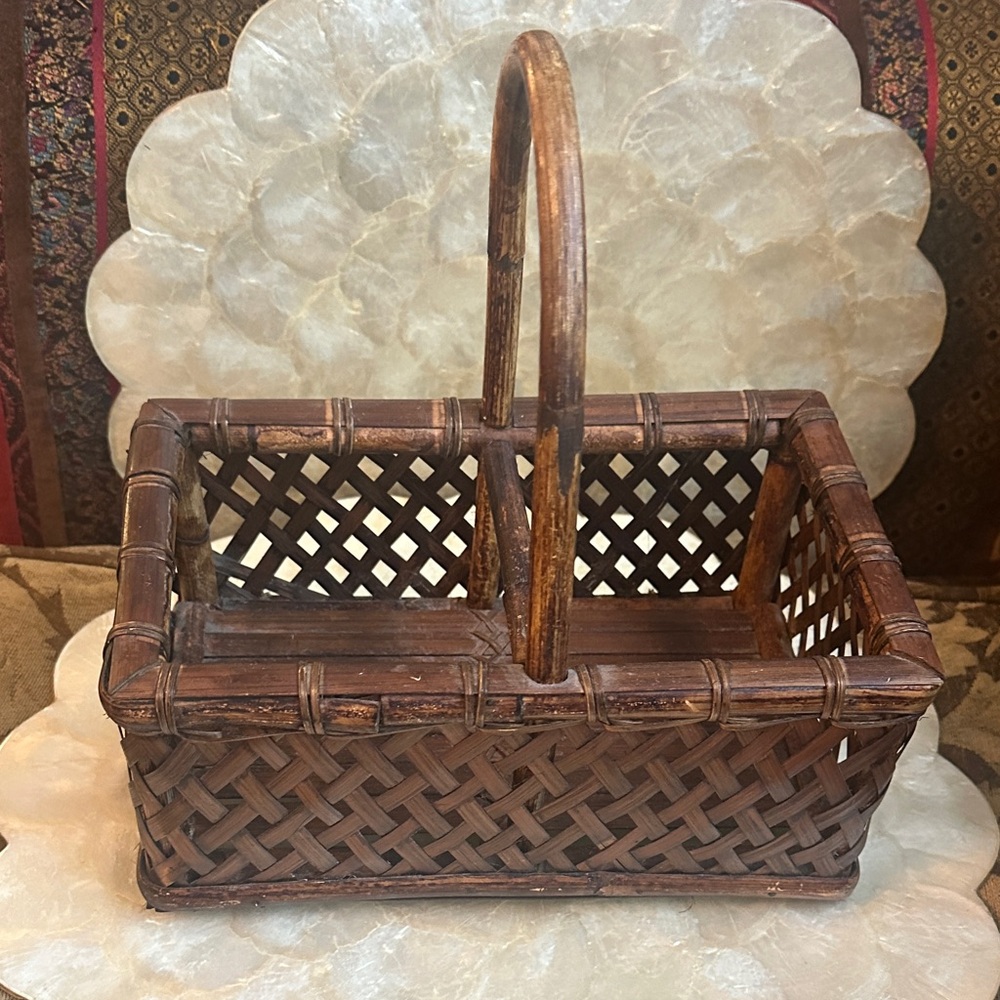 Vintage Brown Woven Basket with Handle unique design.